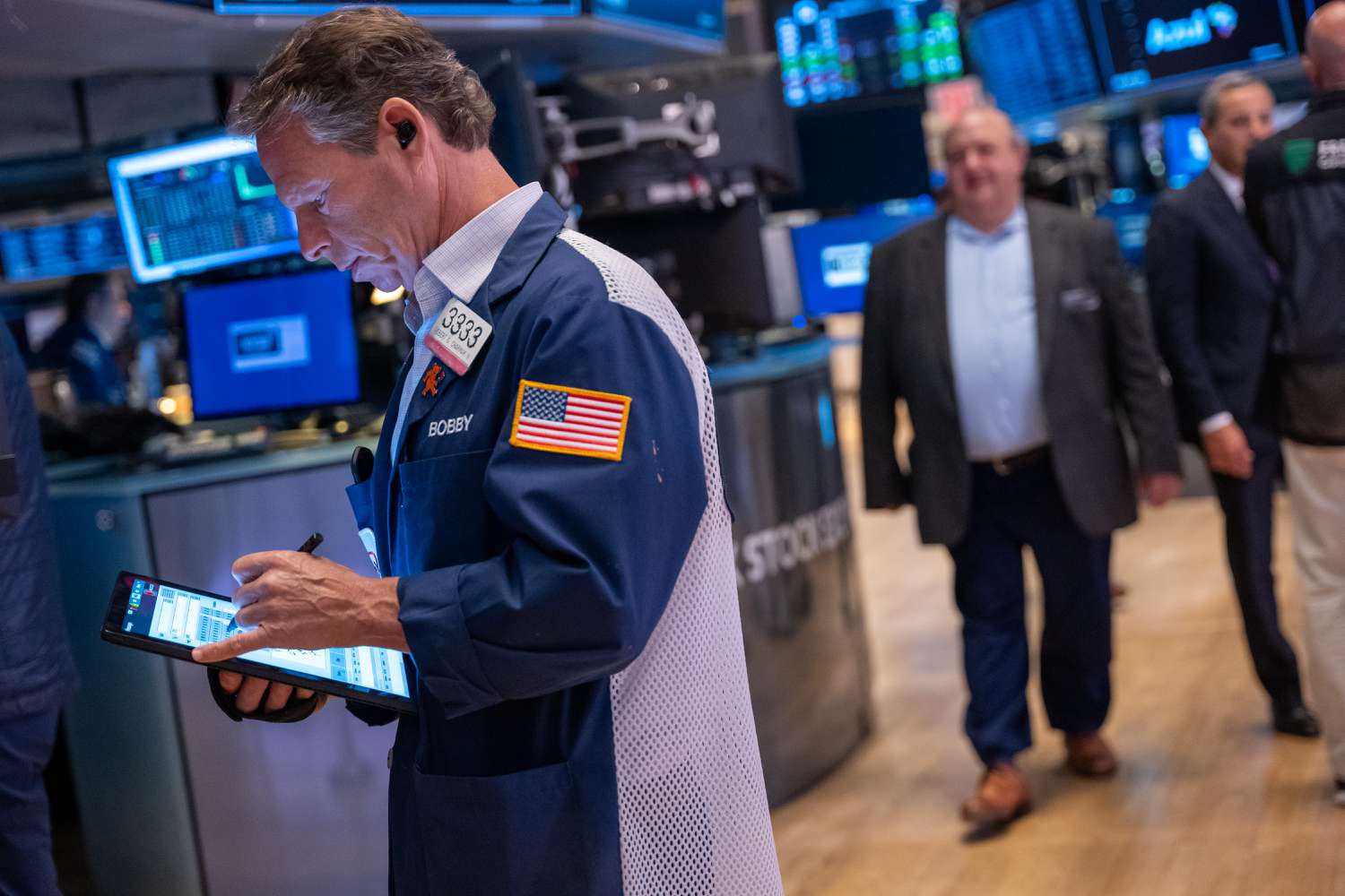 Traders work on the floor of the New York Stock Exchange.