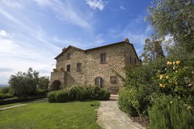 Brick farmhouse style house in Italy.