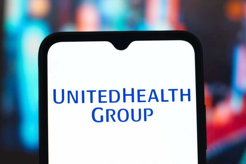 UnitedHealth Group logo is seen displayed on a smartphone screen