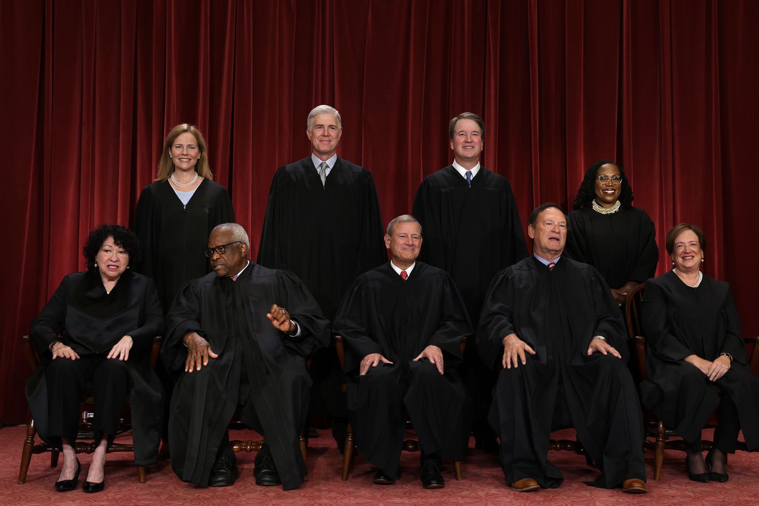 United States Supreme Court (front row L-R) Associate Justice Sonia Sotomayor, Associate Justice Clarence Thomas, Chief Justice of the United States John Roberts, Associate Justice Samuel Alito, and Associate Justice Elena Kagan, (back row L-R) Associate Justice Amy Coney Barrett, Associate Justice Neil Gorsuch, Associate Justice Brett Kavanaugh and Associate Justice Ketanji Brown Jackson pose for their official portrait at the East Conference Room of the Supreme Court building on October 7, 2022 in Washington, D.C.