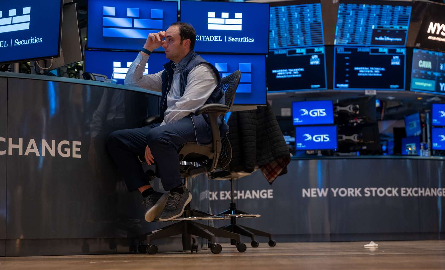 Traders work on the floor of the New York Stock Exchange.