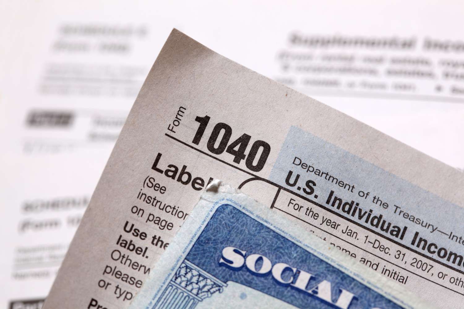 A shotof social security card and tax form.