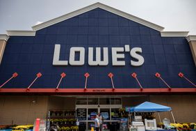 Consumers visit a Lowe's store