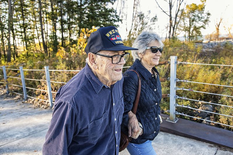World War II U.S. military veteran father and daughter walking
