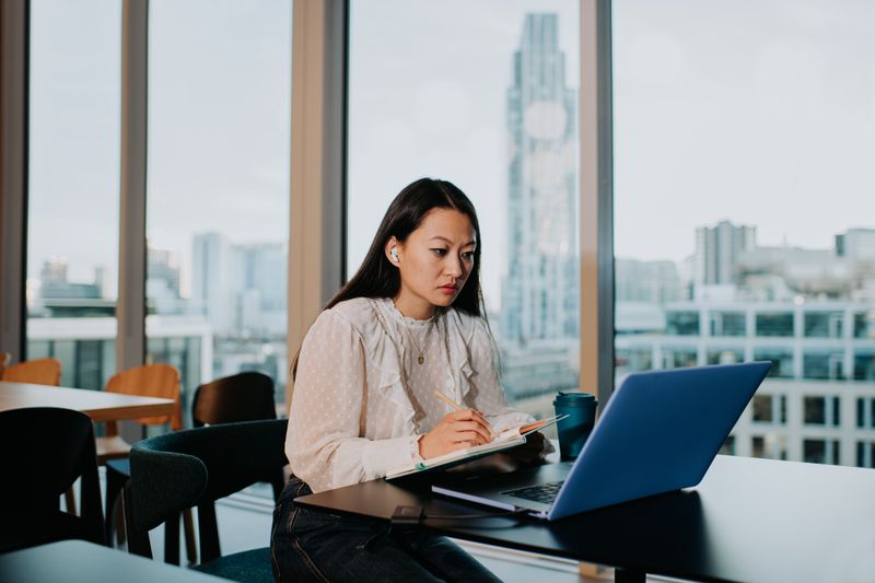 Woman studying how to use her 529 savings to study abroad