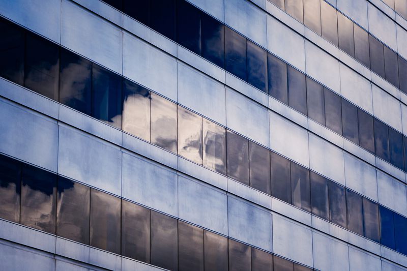 Reflections on the windows of an office building