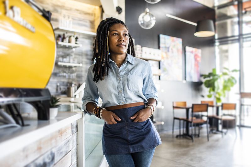 Owner in coffee shop