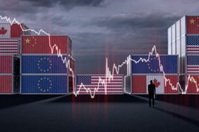 Conceptual illustration showing stacked shipping containers painted with the American, Chinese, European Union, Canadian and Mexican flags, symbolizing trade and export/import industry, overlayed by a man looking at a financial graph.