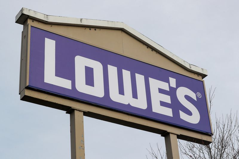 A sign with the Lowe's logo is seen outside of a Lowe's home improvement store