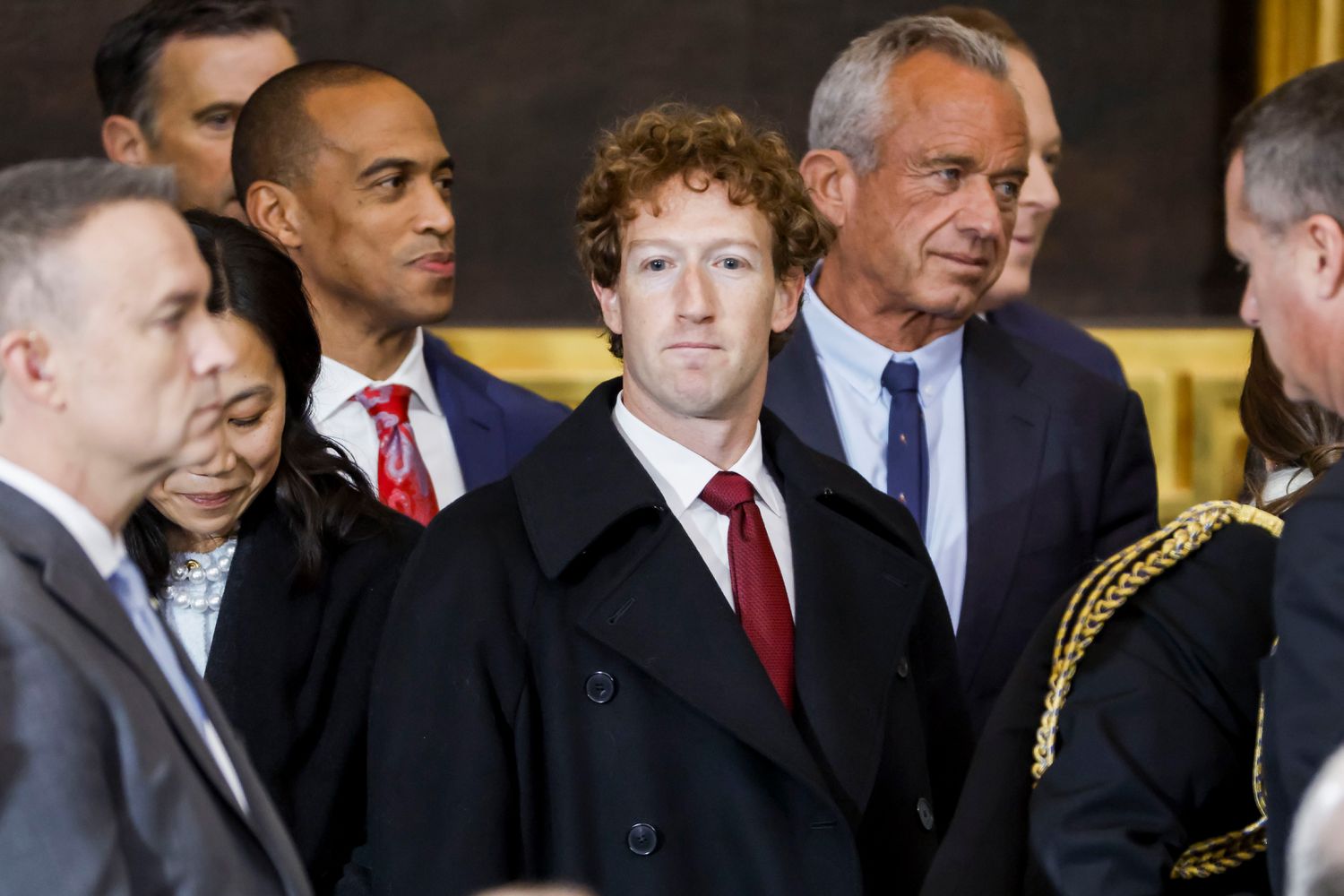 Meta Platforms CEO Mark Zuckerberg (center) attends the inauguration of President Donald Trump in Washington, D.C., on Jan. 20, 2025.