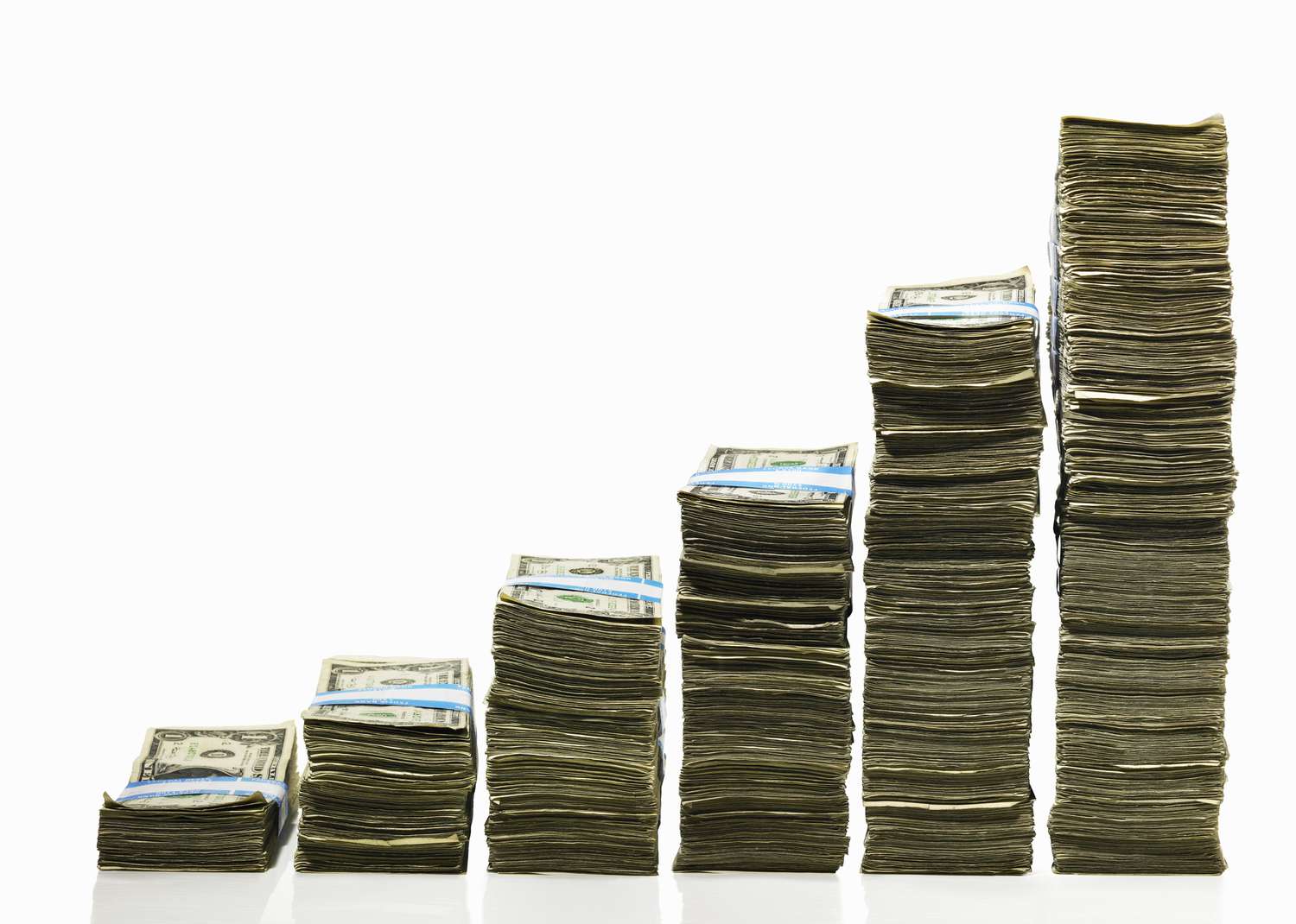 Stacks of US currency in ascending graph pattern.