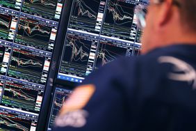  Traders work on the floor of the New York Stock Exchange
