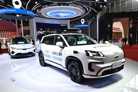 A Pony.ai AION robot taxi is displayed during the 21st Shanghai International Automobile Industry Exhibition at the National Exhibition and Convention Center in Shanghai.