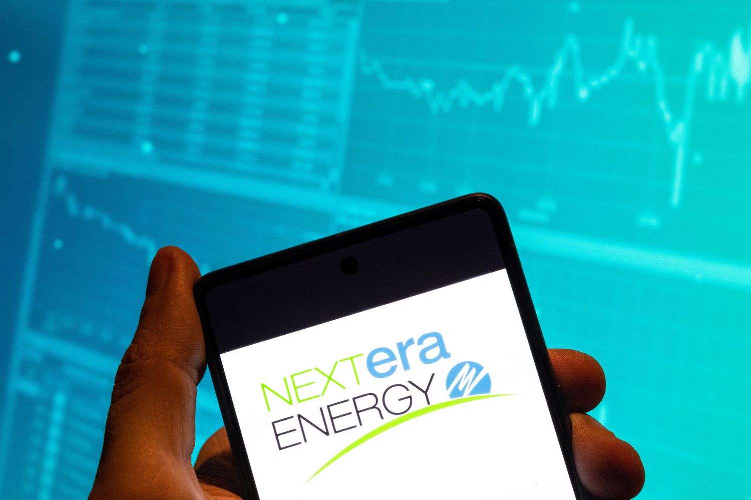 NextEra Energy logo on a smartphone