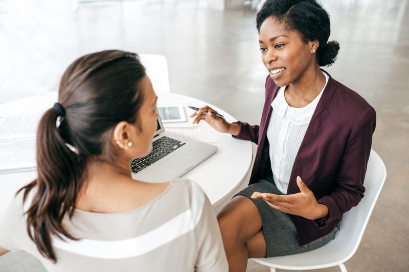 Business Meeting Between Two Businesswomen