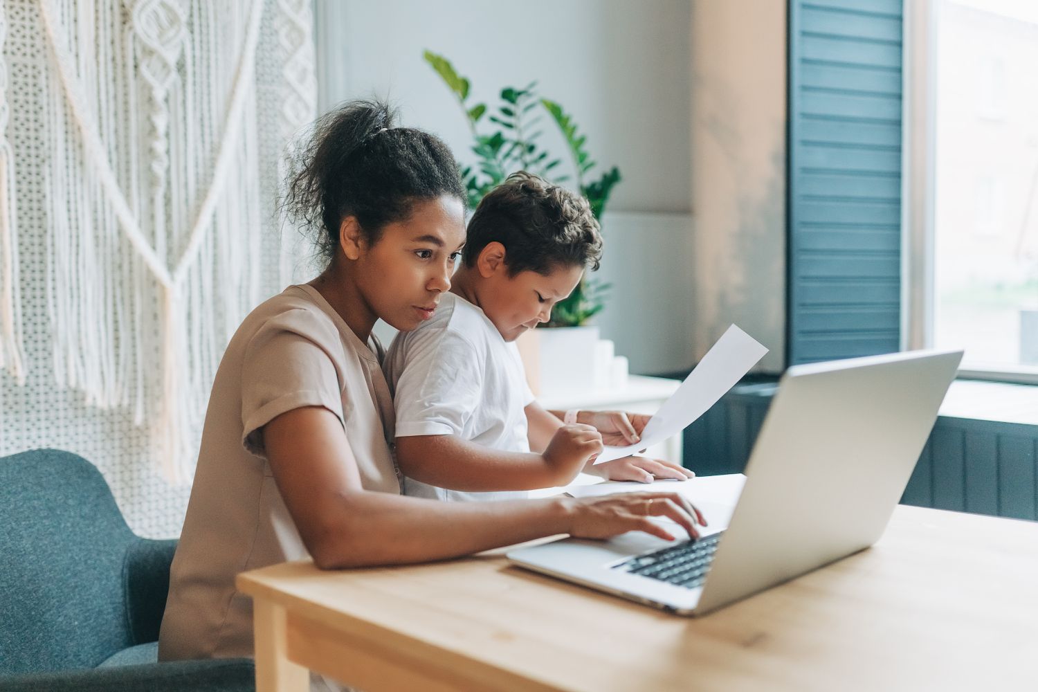 Mother reviewing tips for creating a 529 plan