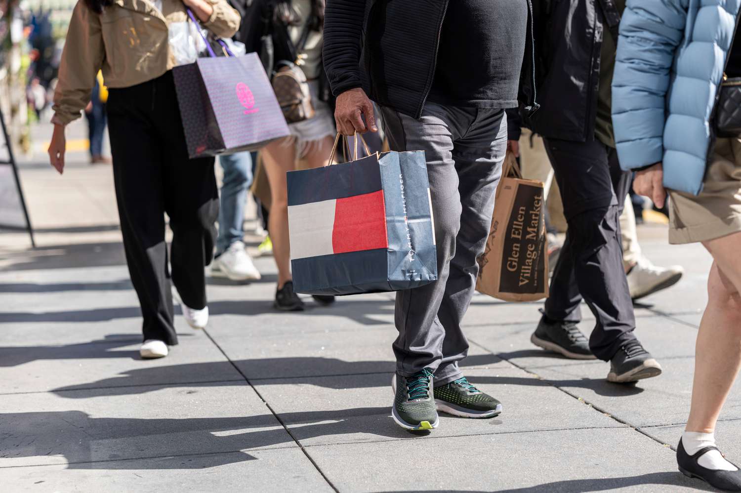 Shoppers carry bags in the Union Square neighborhood of San Francisco, California, US, on Friday, June 7, 2024.