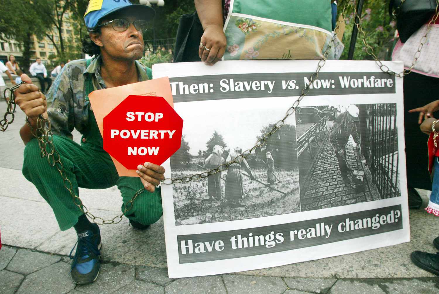 Protester Andy Thomas participates in a demonstration against welfare reform in Union Square August 22, 2002 in New York City. 