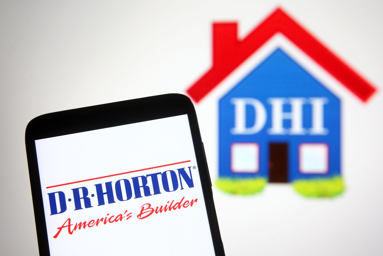 D.R. Horton, Inc. logo of a home construction company is seen on a smartphone screen