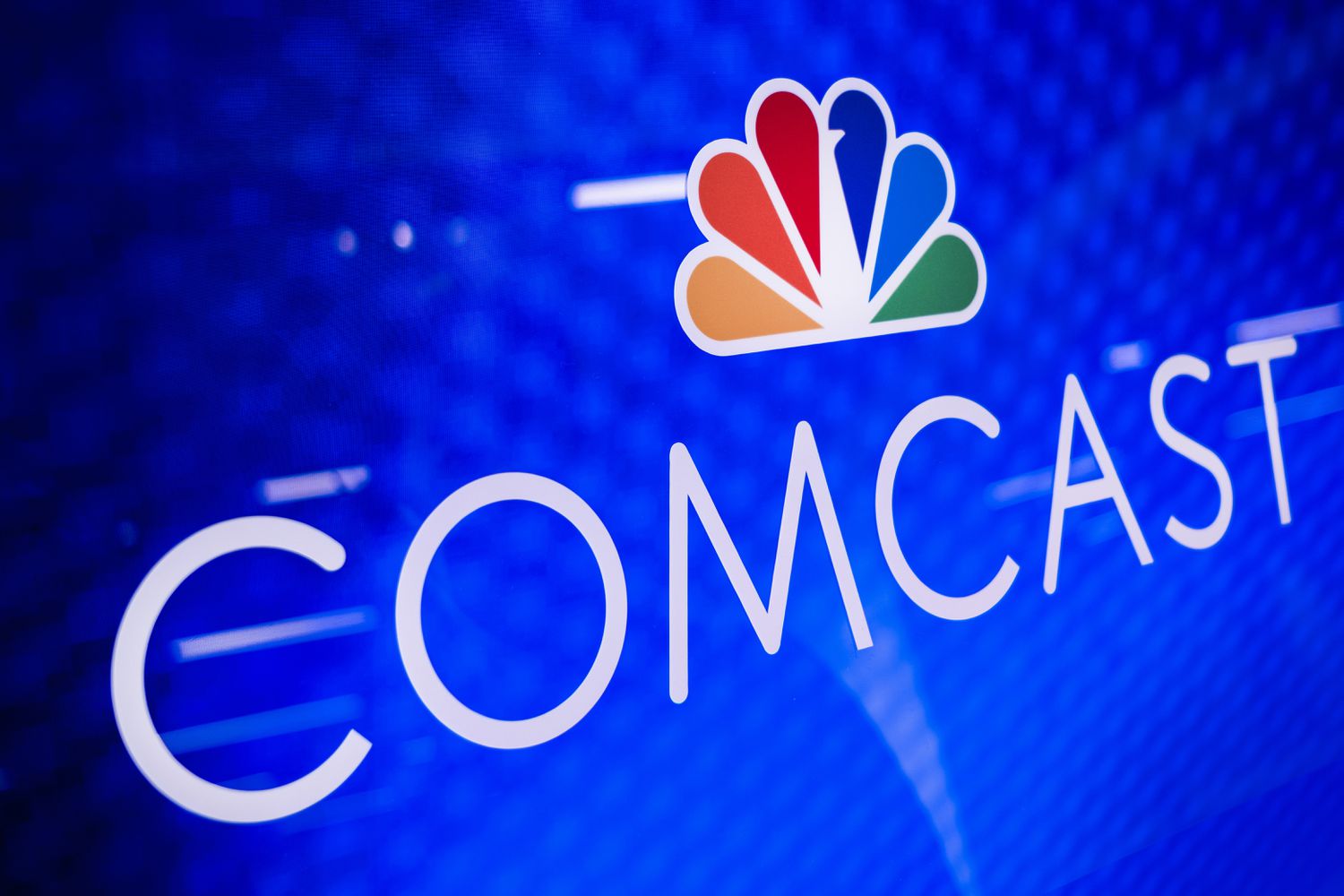 A Comcast logo is displayed at Comcast Center in Philadelphia