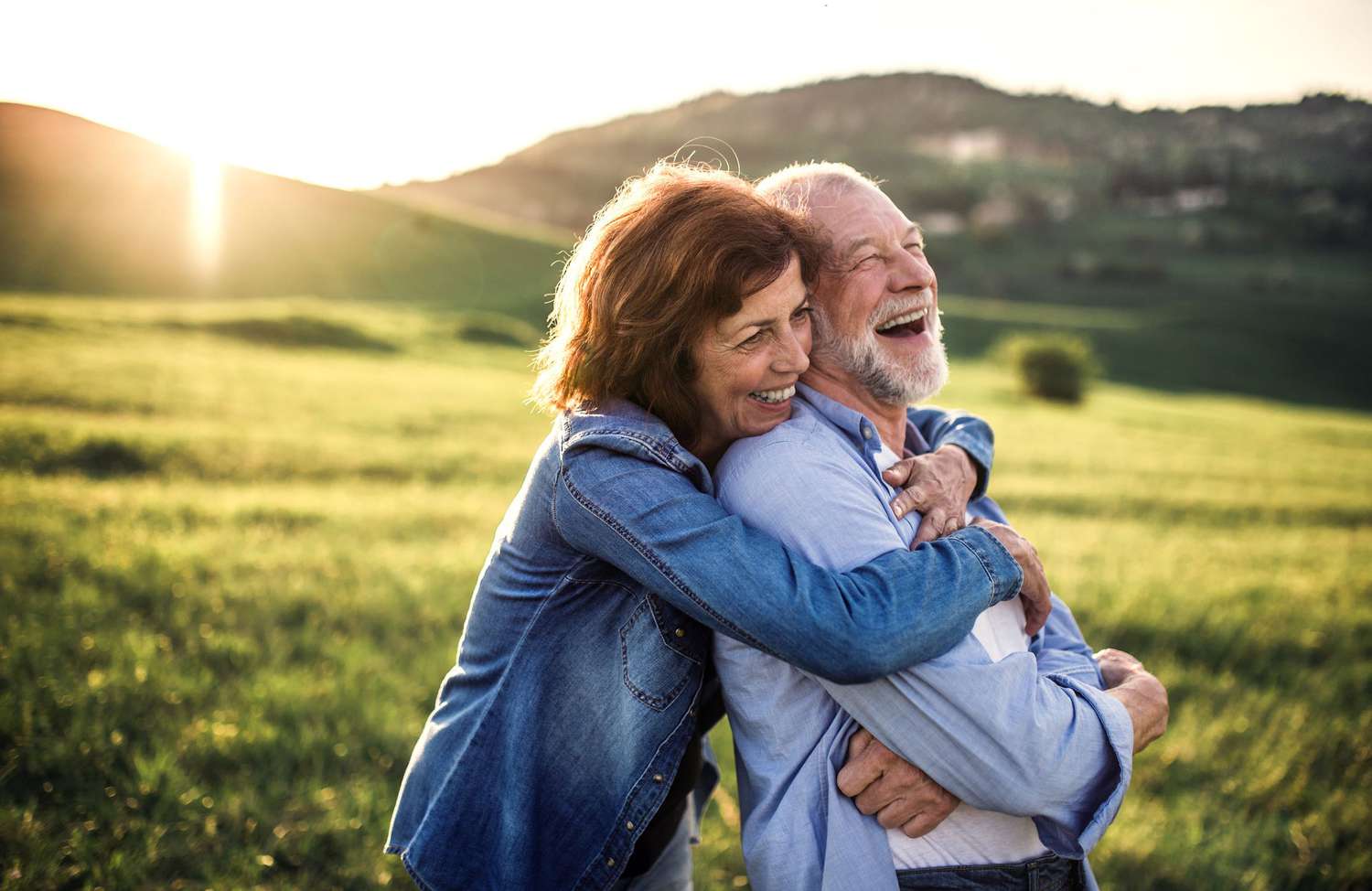 Couple hugging outside
