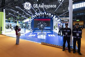 The GE Aerospace booth is seen on the floor of a conference