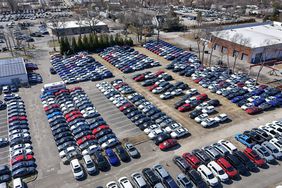 Cars at a dealership in Smithtown, N.Y., in late March. 