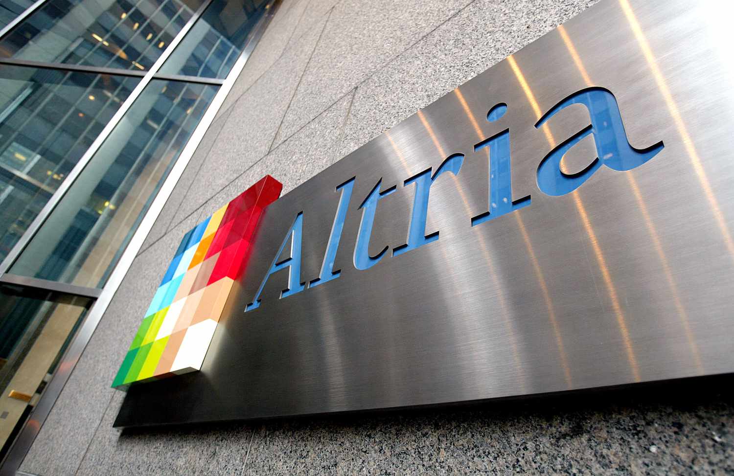 Altria placard on the facade of a New York City office building.