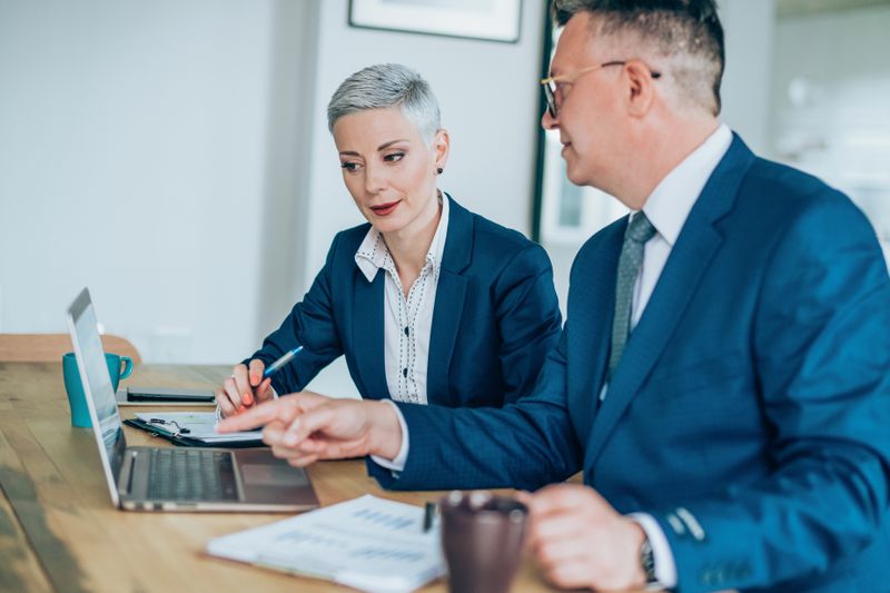 Insurance and reinsurance agent coming to an agreement about quota share treaty.