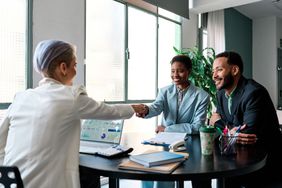 Financial Advisor speaks with Clients about CD Rates