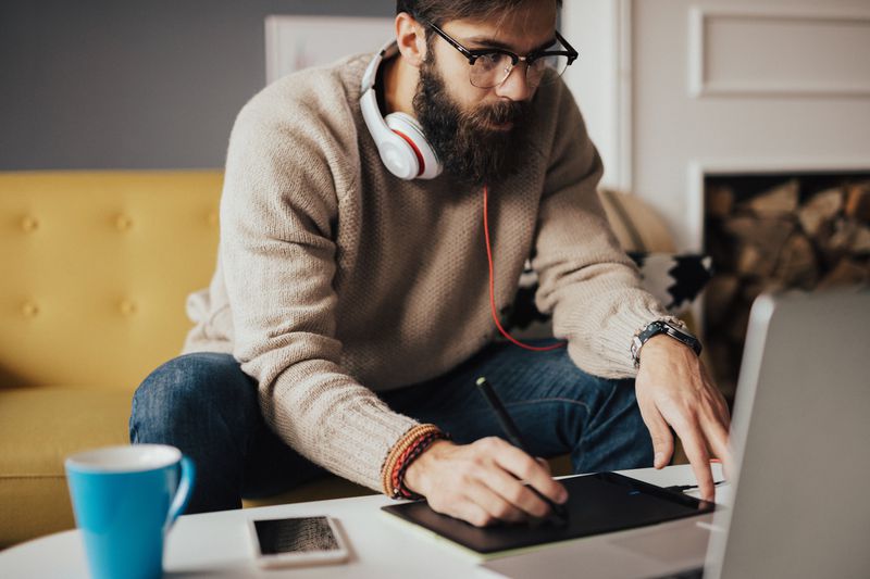 Freelancer working at laptop