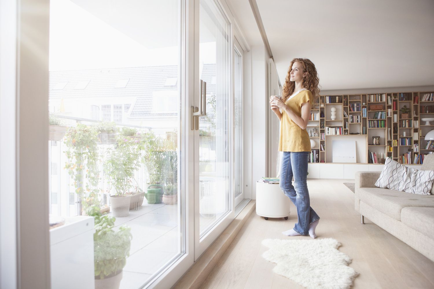 A young adult enjoys a home.
