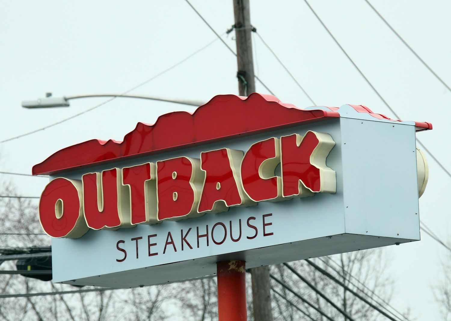 An Outback Steakhouse sign. 