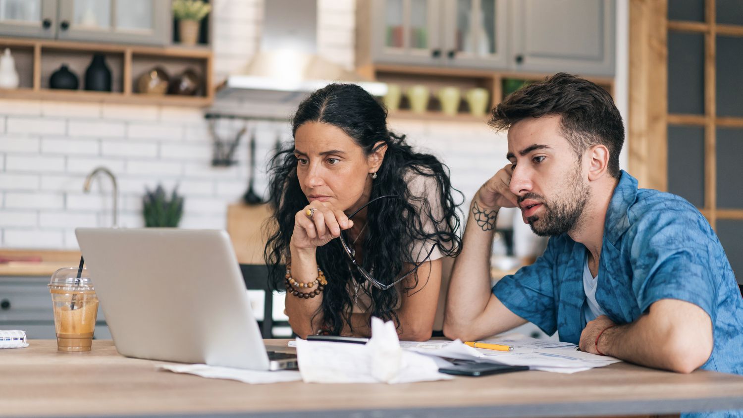 Couple calculating their mortgage payments