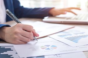 accountant analyzing financial information