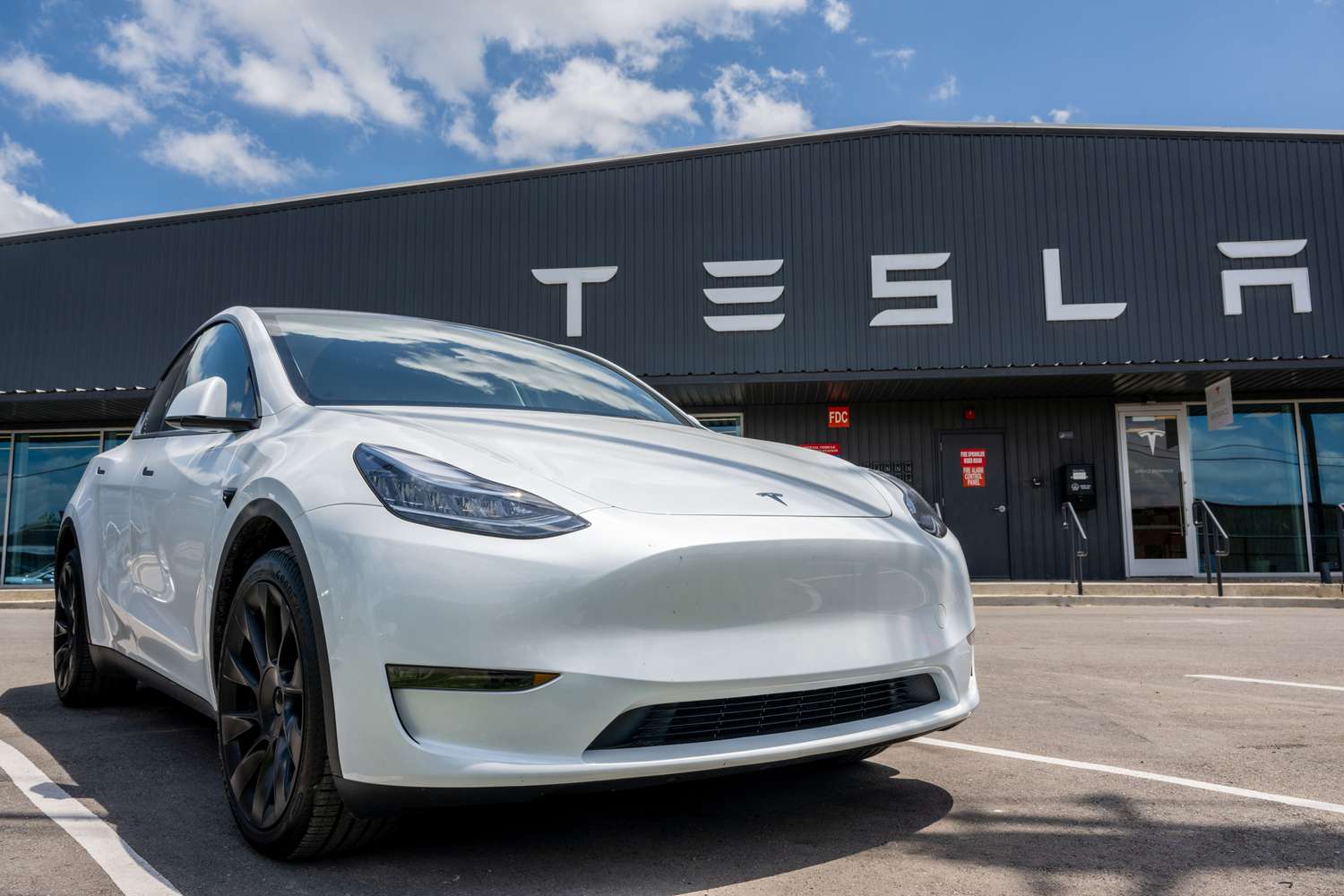 A Tesla Model Y on a Tesla dealership lot in Austin, Texas