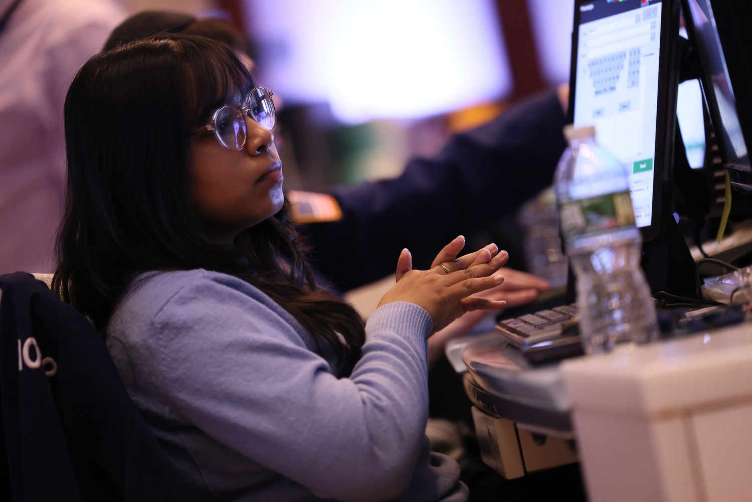 Traders work on the floor of the New York Stock Exchange