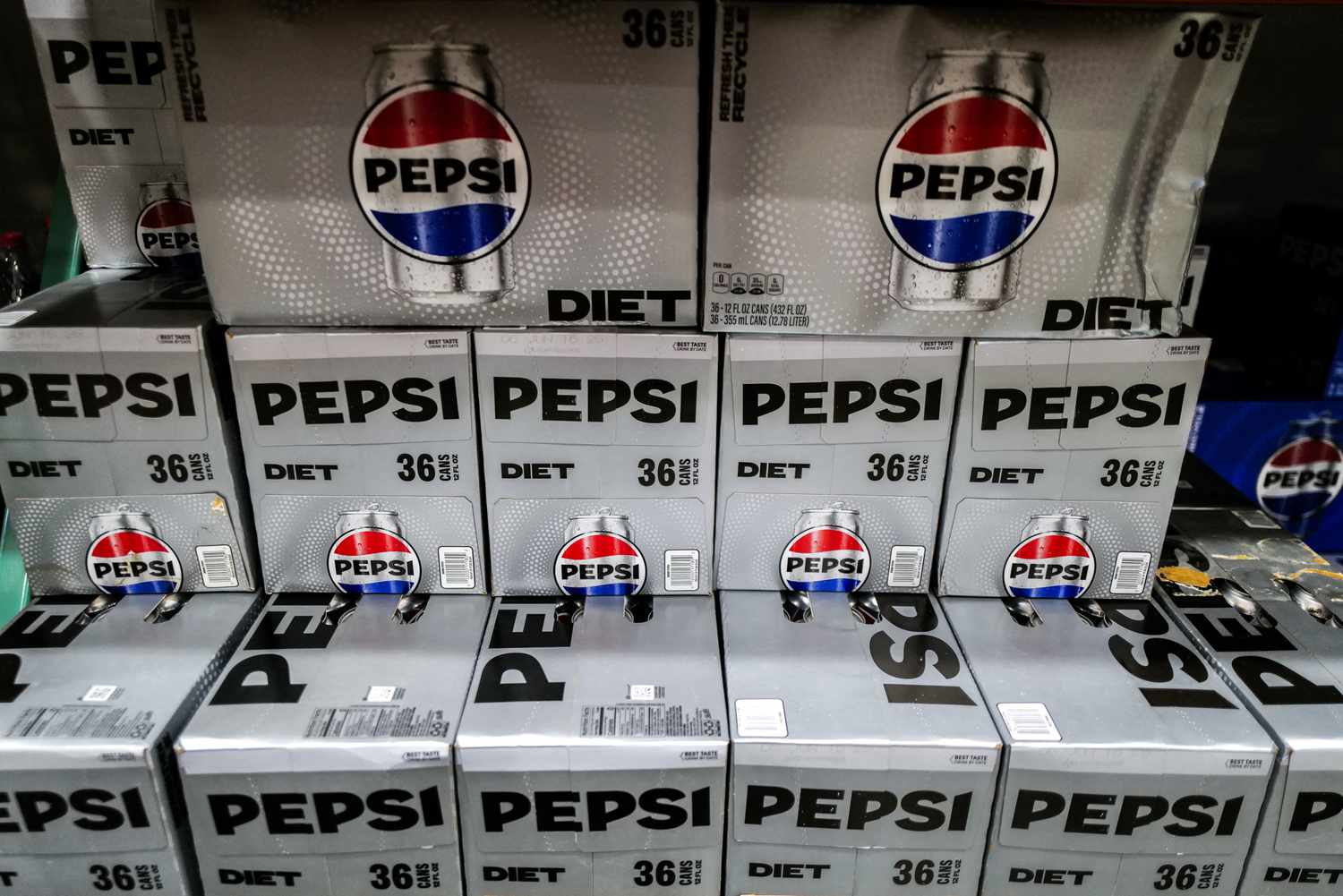 Gray boxes of Diet Pepsi soda are seen on a store shelf.