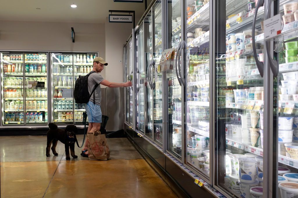 A customer shops for dairy products at a supermarket in Manhattan on July 11, 2024 in New York City.
