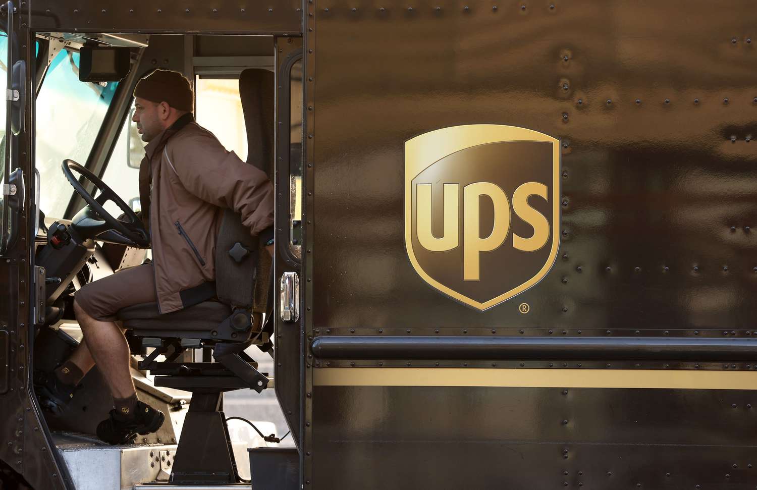 A United Parcel Service driver sitting in his truck.
