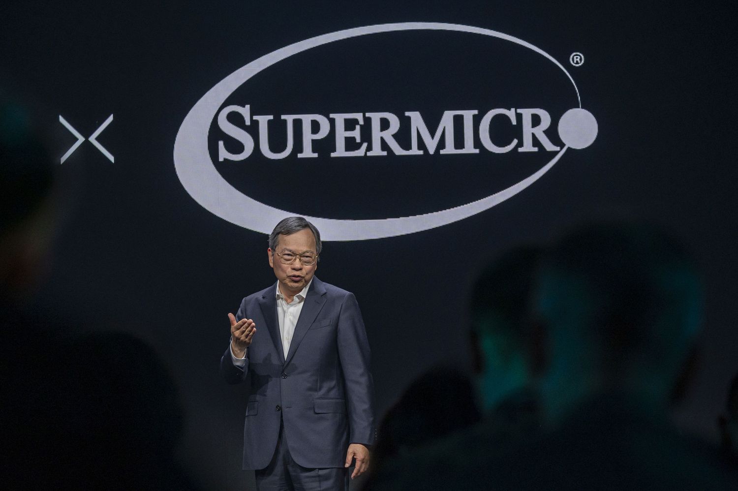 Super Micro Computer CEO Charles Liang speaking at an artificial intelligence event in December 2023