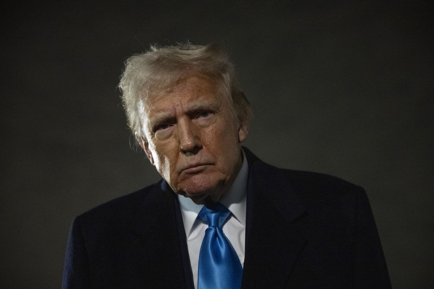 US President Donald Trump speaks to the press upon arrival at Joint Base Andrews in Maryland on February 2, 2025, as he returns to the White House from Florida. 