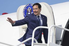 U.S. Secretary of State Marco Rubio boarding a plane in February 2025