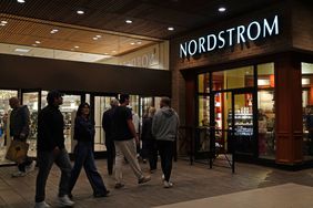 Shoppers approach a Nordstrom store. 