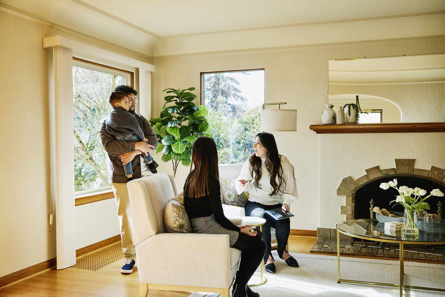 A family getting advices from financial advisor about the risks of home equity loan.