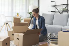 Woman unpacking boxes
