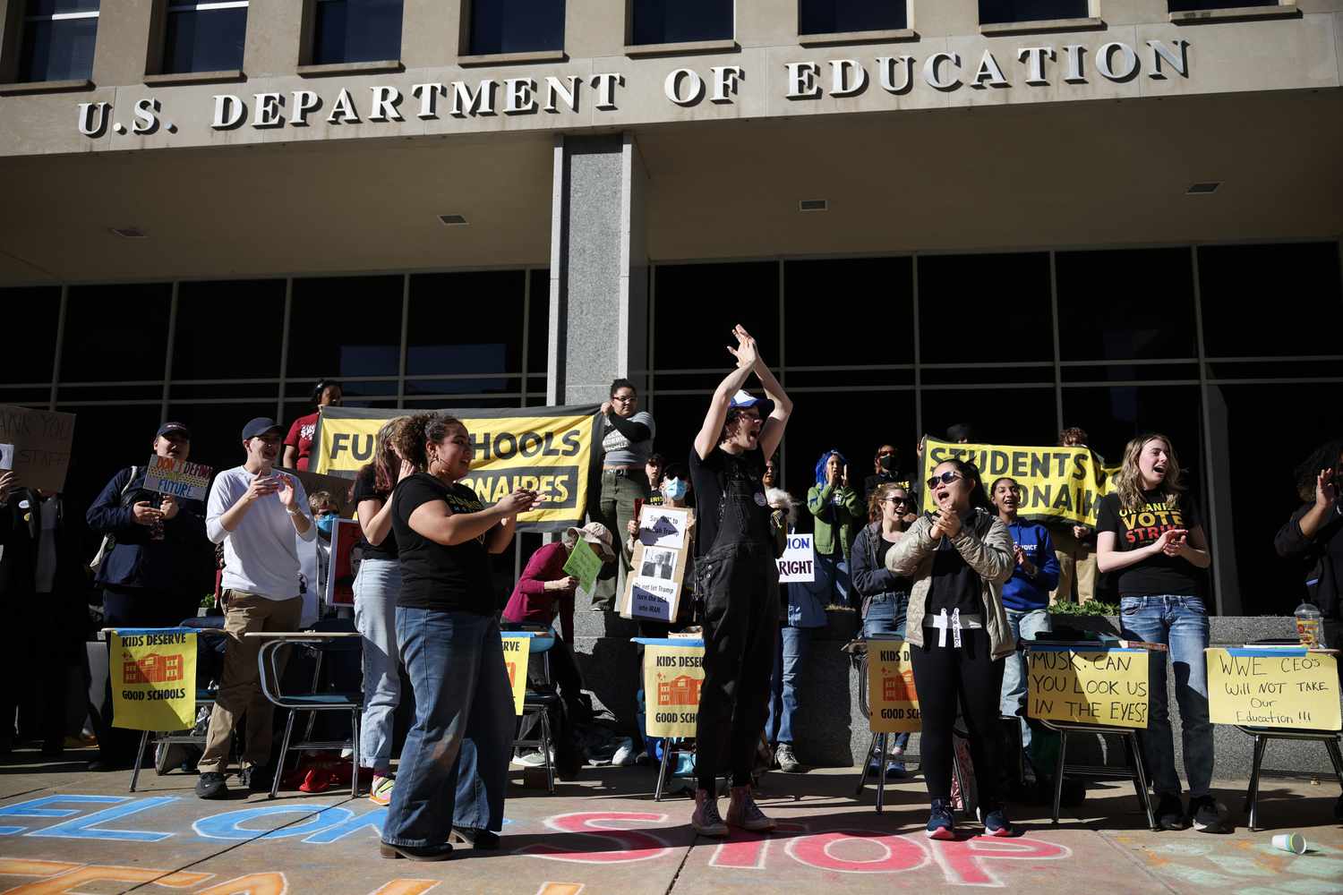 Protestors participate in the "Rally to Defend Our Schools" in front of the U.S. Department of Education on March 21, 2025 in Washington, DC.