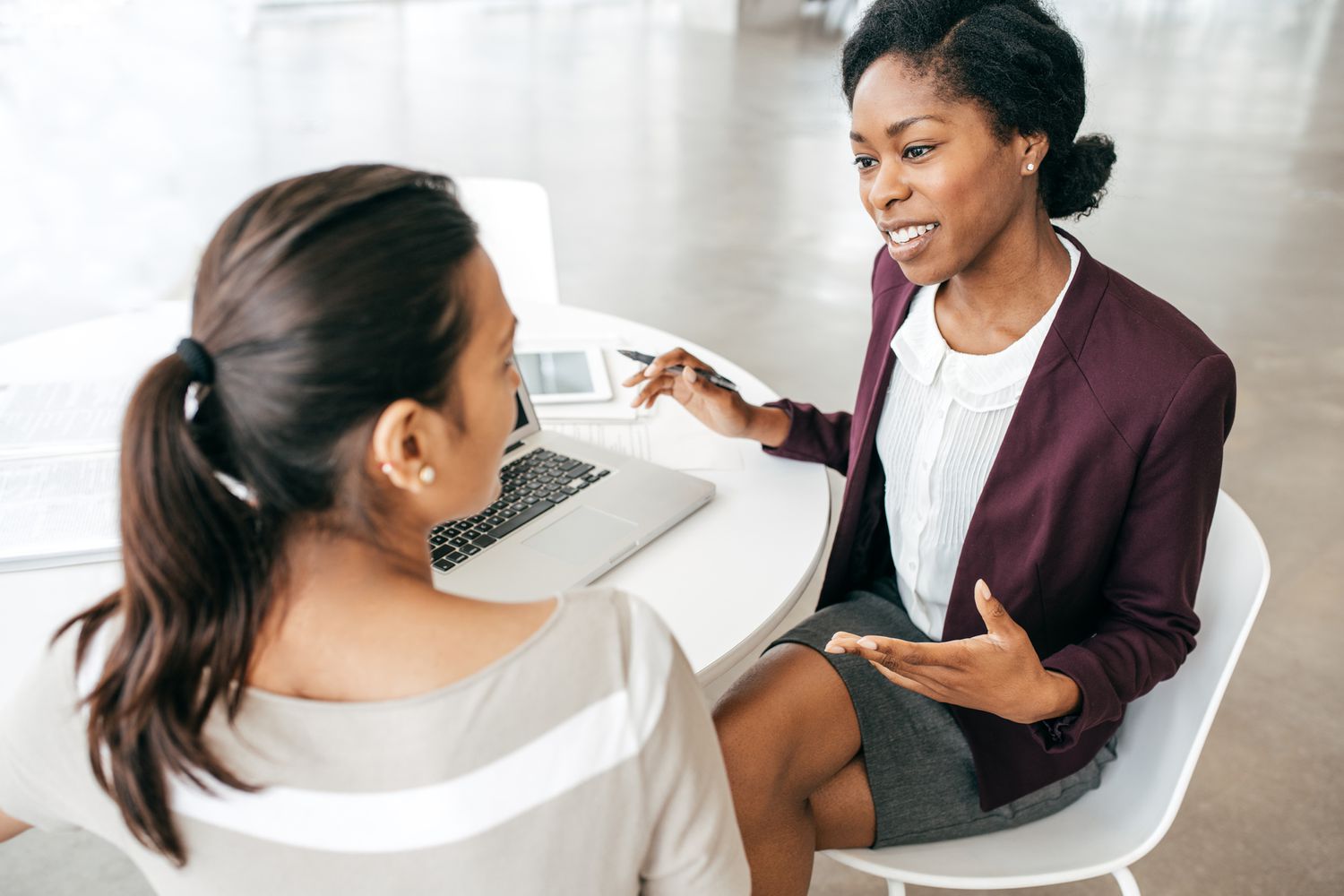 Banker discussing account options with customer
