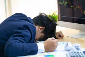 Stock Trader Tearing out His Hair From Despair