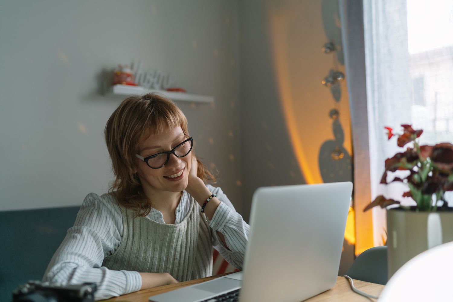 Woman sitting at computer